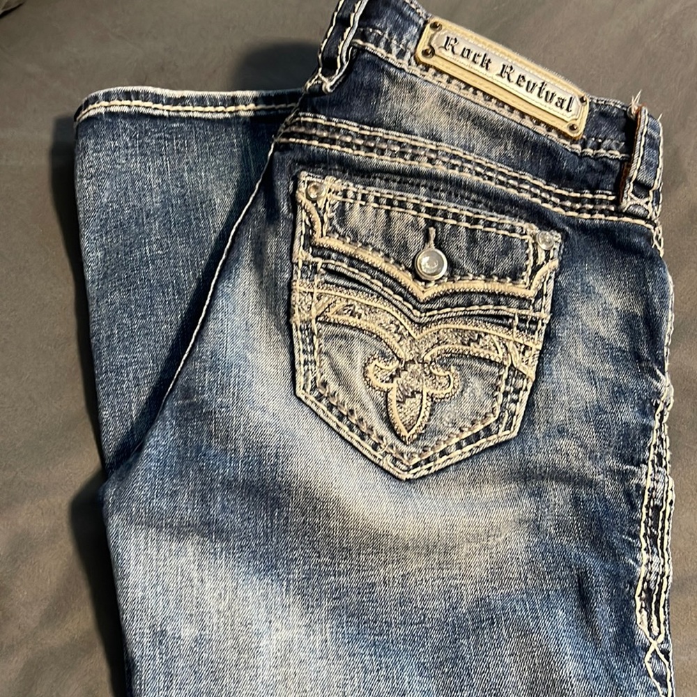 Light blue Rock Revivals size 27 worn once.